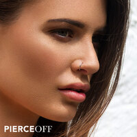 beautiful brunette woman wearing a nose ring in her nose piercing