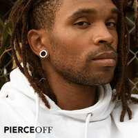 Cool young man with dreads and stretched lobes