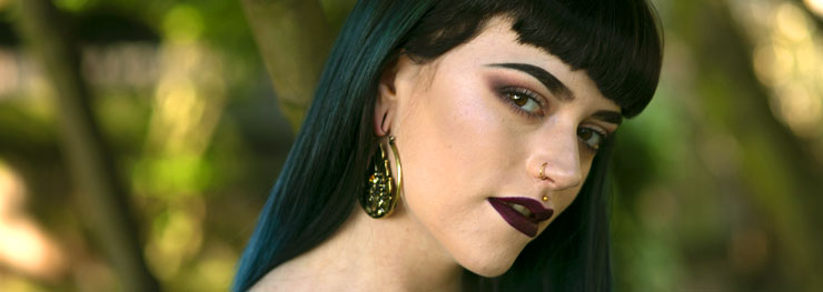 Attractive woman with gold jewellery